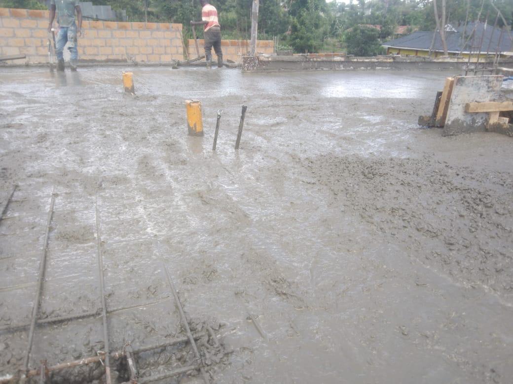 Our ready-mix concrete being transported and applied, demonstrating efficient construction practices.