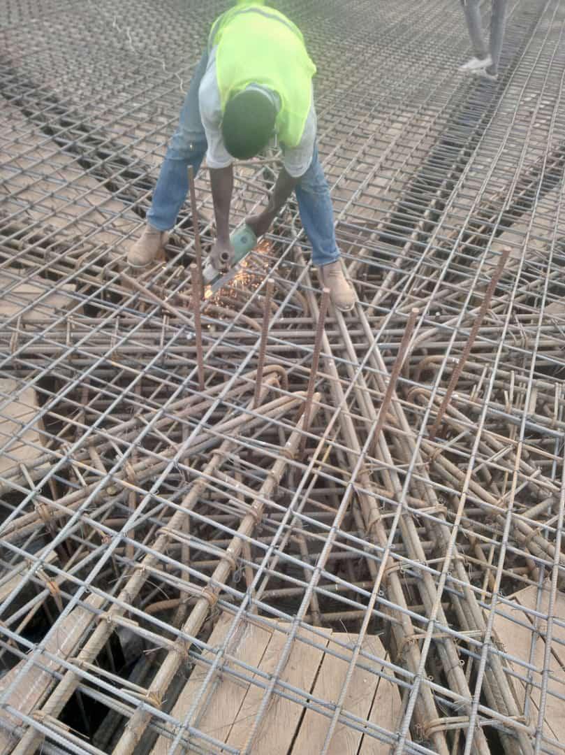 Our ready-mix concrete being transported and applied, demonstrating efficient construction practices.