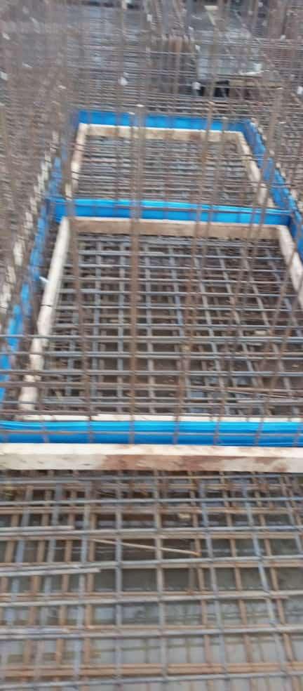 Our ready-mix concrete being transported and applied, demonstrating efficient construction practices.