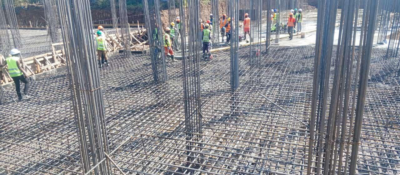 Our ready-mix concrete being transported and applied, demonstrating efficient construction practices.