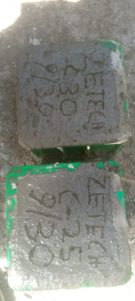 Our ready-mix concrete being transported and applied, demonstrating efficient construction practices.