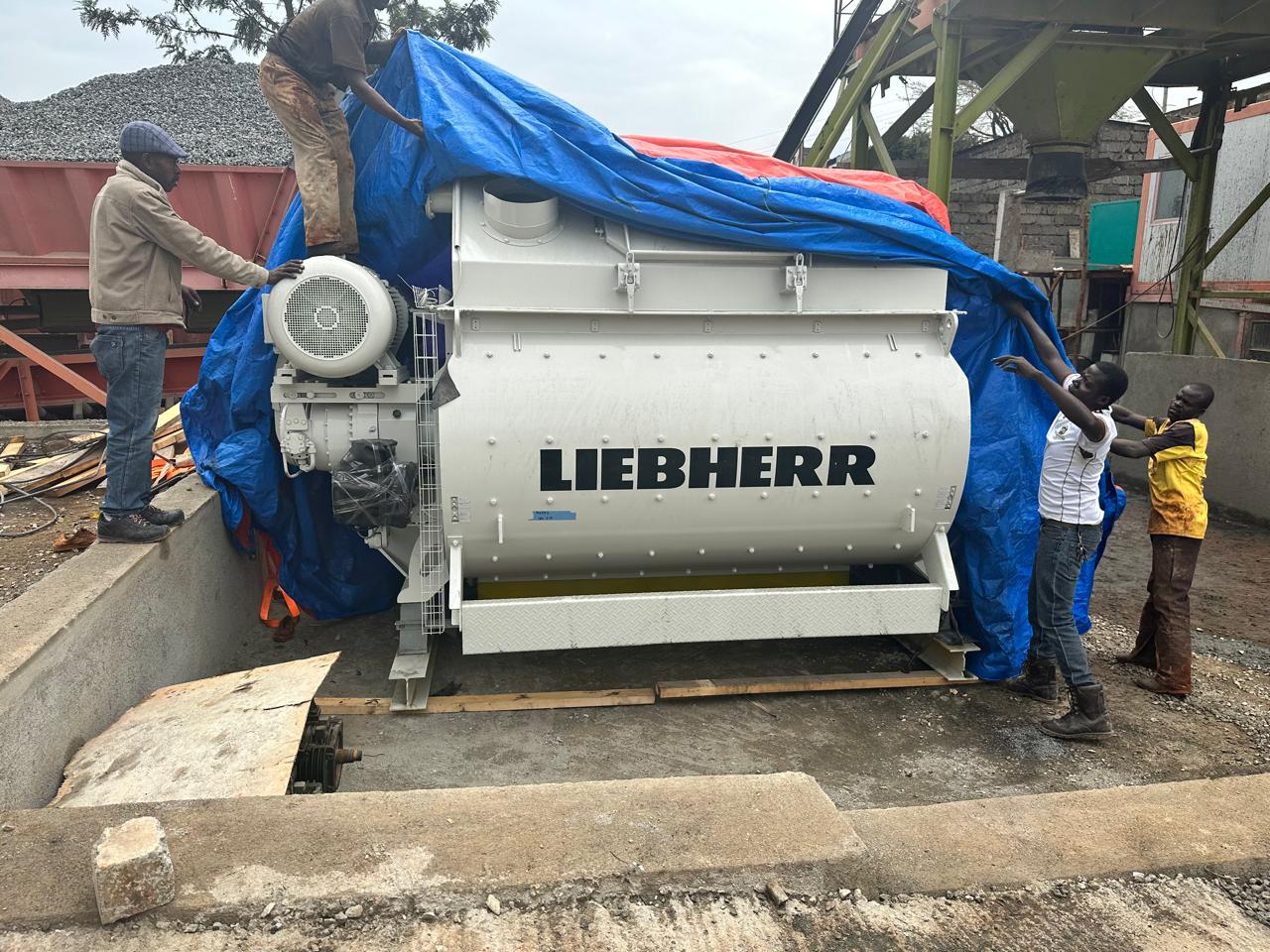 Concrete being prepared, transported, and placed efficiently by our team on site.