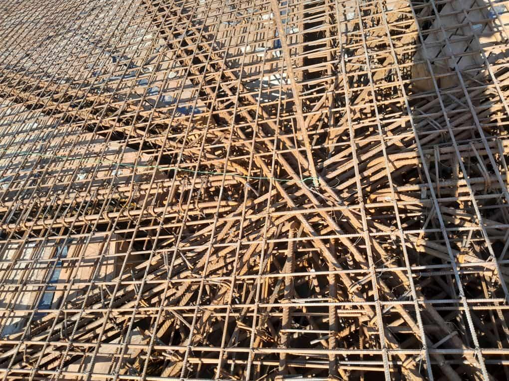 Our ready-mix concrete being transported and applied, demonstrating efficient construction practices.