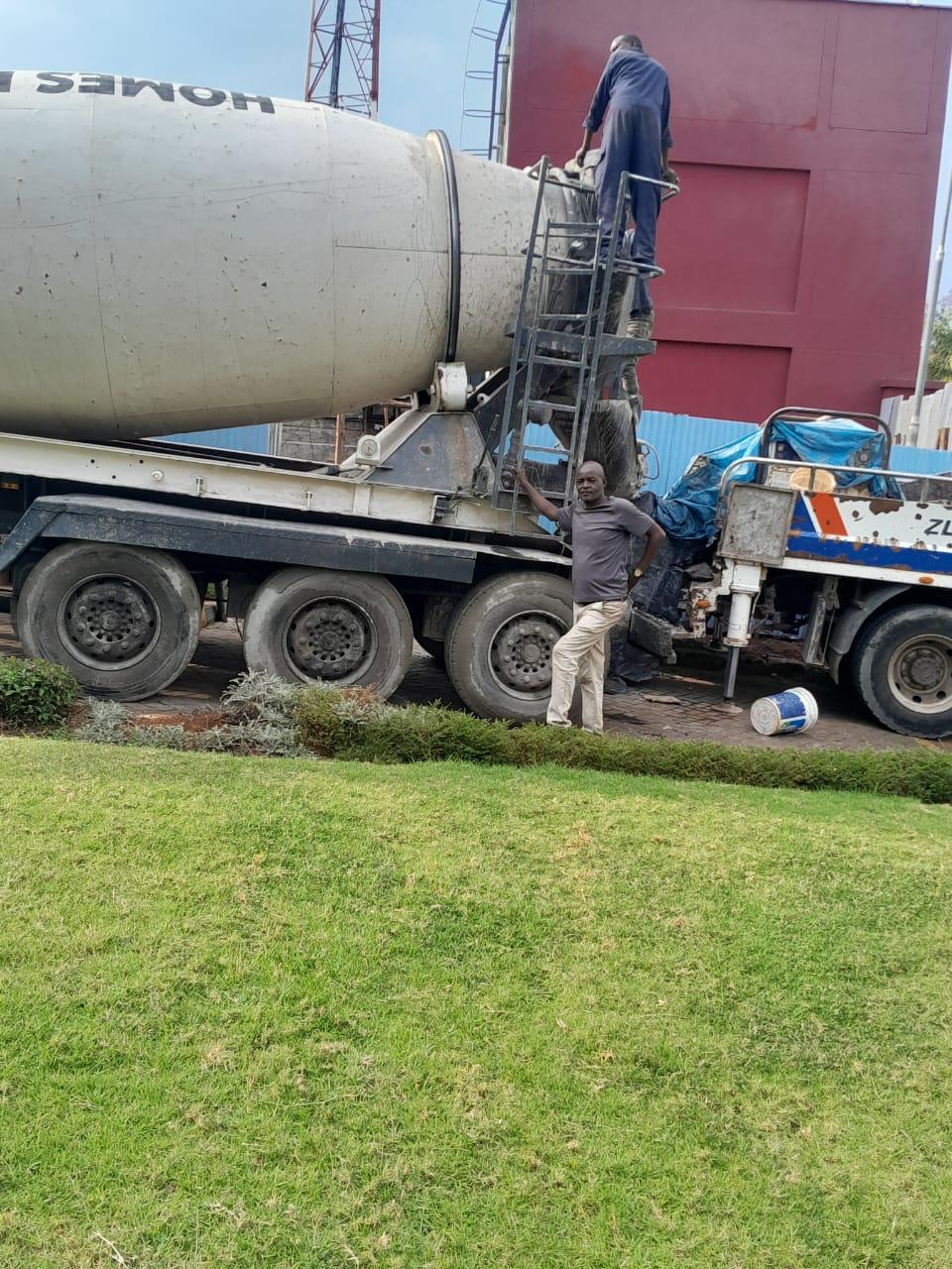 Our ready-mix concrete being transported and applied, demonstrating efficient construction practices.