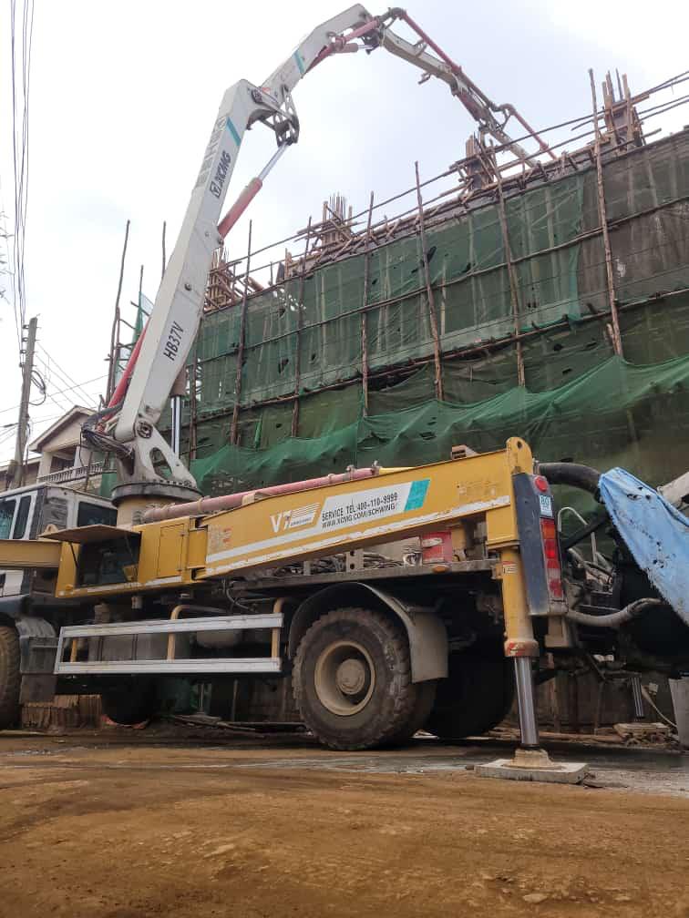 Our ready-mix concrete being transported and applied, demonstrating efficient construction practices.