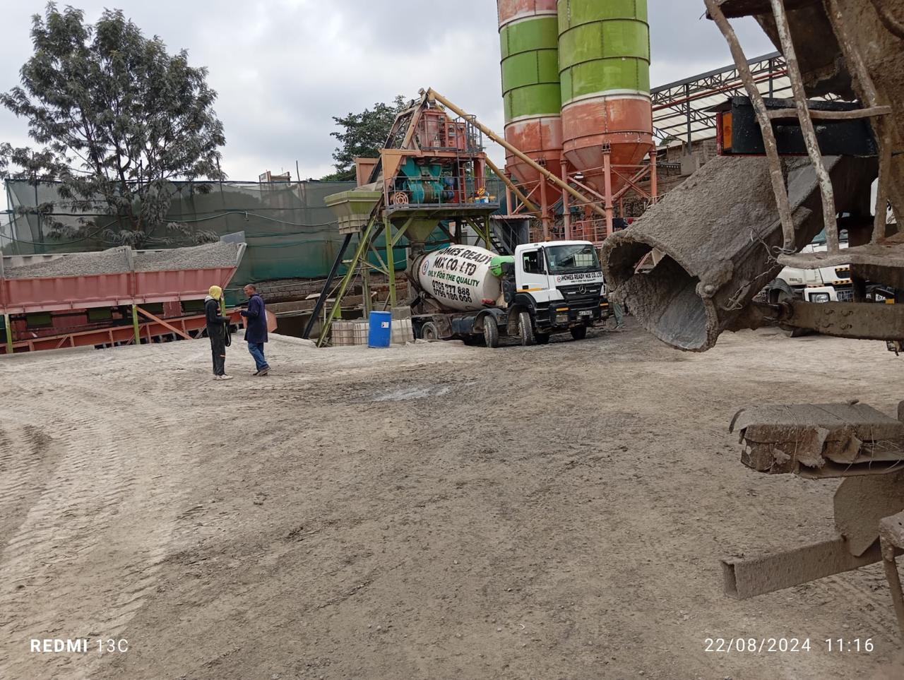 Images capturing the process of concrete pouring and site preparation for various projects.