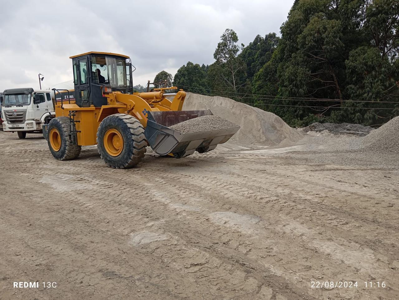 Concrete being prepared and handled with care, illustrating the process from batching to placement.