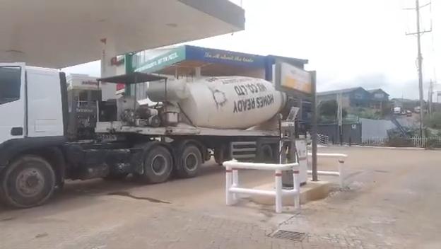 heavy machinery and construction equipment in operation, supporting efficient concrete and structural works.