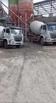 workflow of construction sites, integrating equipment, materials, and labor in synchronized operations.