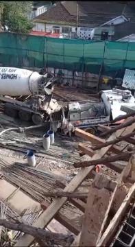 A glimpse of our ready-mix concrete in action, showing operations from mixing to delivery on site.