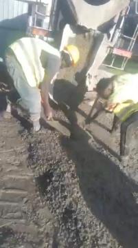 Concrete being prepared and handled with care, illustrating the process from batching to placement.