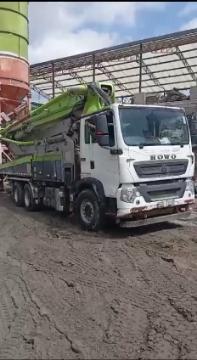 Our ready-mix concrete being transported and applied, demonstrating efficient construction practices.