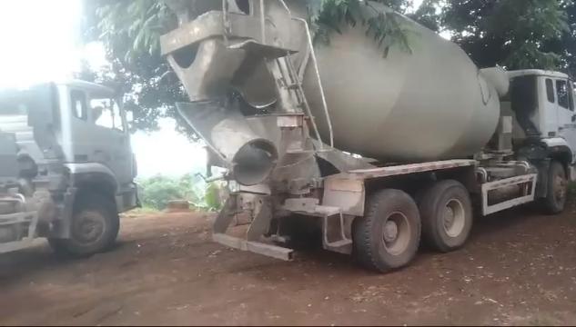 Our ready-mix concrete being transported and applied, demonstrating efficient construction practices.