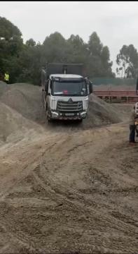 Our ready-mix concrete being transported and applied, demonstrating efficient construction practices.