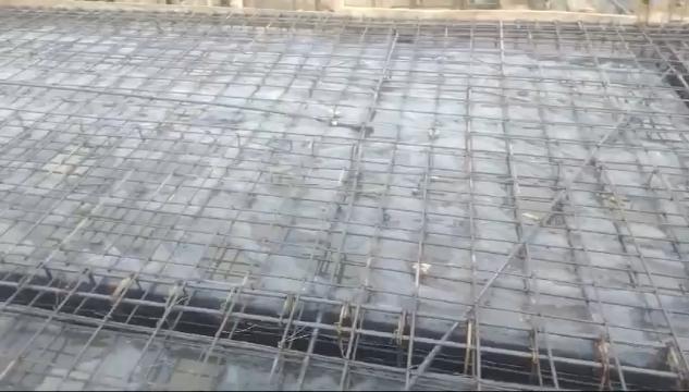 Our ready-mix concrete being transported and applied, demonstrating efficient construction practices.