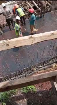 Our ready-mix concrete being transported and applied, demonstrating efficient construction practices.