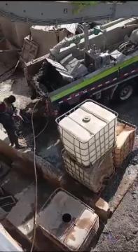 Our ready-mix concrete being transported and applied, demonstrating efficient construction practices.