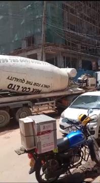 Images capturing the process of concrete pouring and site preparation for various projects.