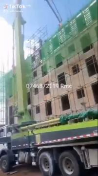 Images capturing the process of concrete pouring and site preparation for various projects.