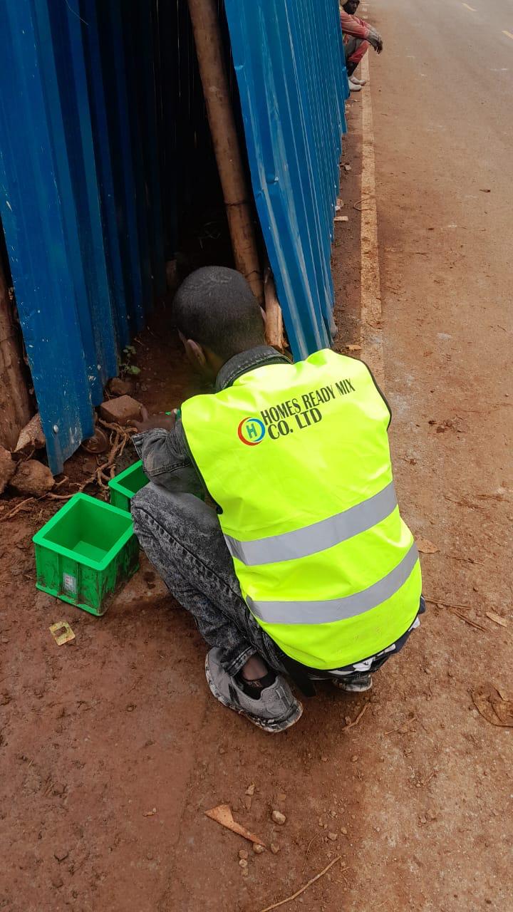 Our ready-mix concrete being transported and applied, demonstrating efficient construction practices.